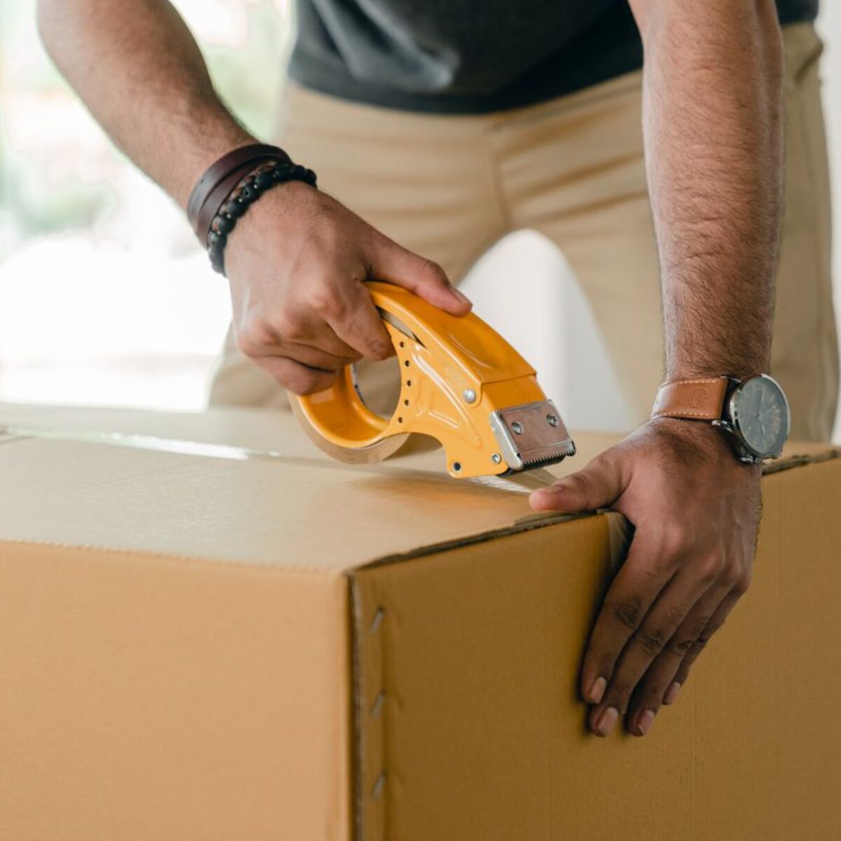 TAKL pro boxing up items for a same-day move